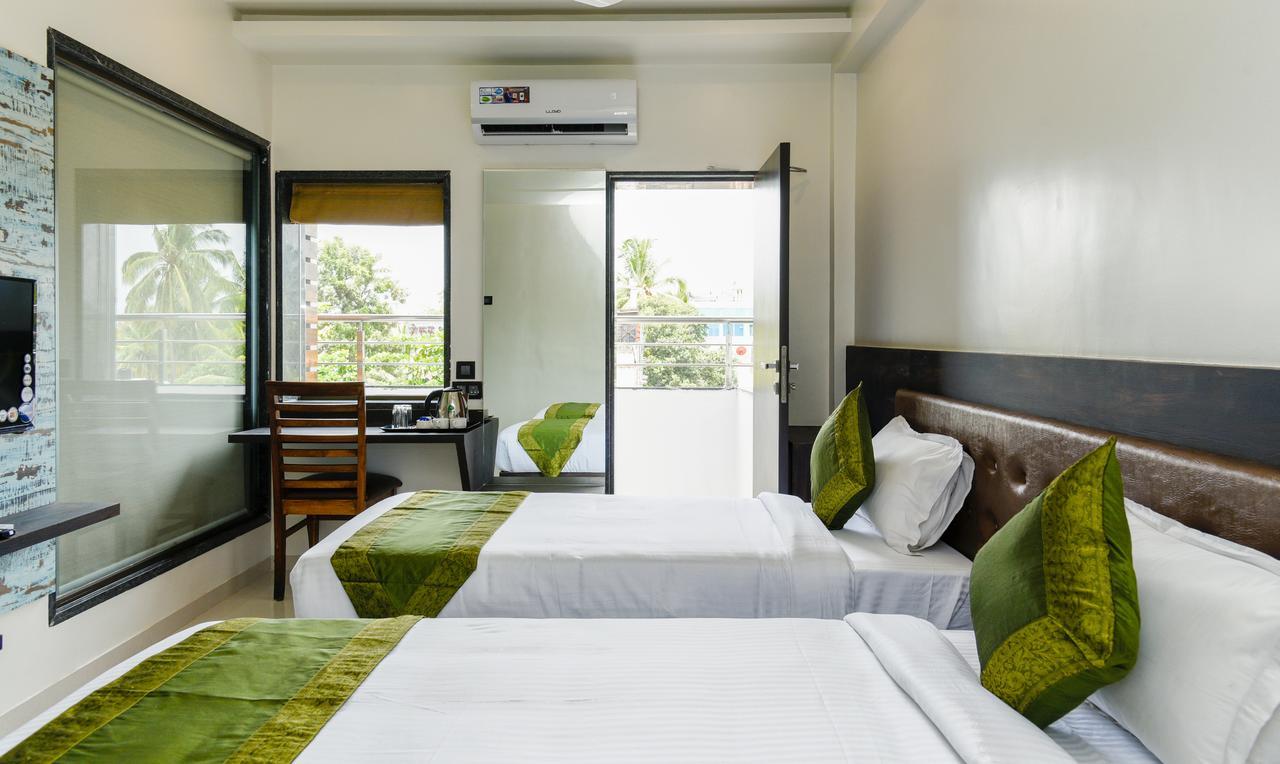 Treebo Malhaar Regency Hotel Chinchvad ภายนอก รูปภาพ